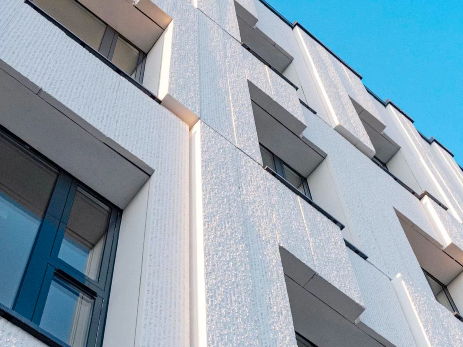 Decorative and facade coatings for development